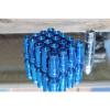 SYNERGY 12X1.5 20PC OPEN END STEEL EXTENDED LUG NUTS BLUE LOCK+KEY
